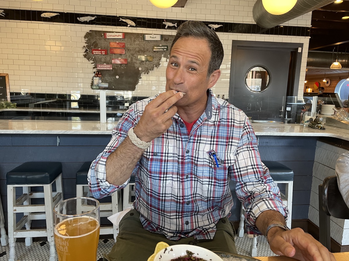 Sam Calagione samples Smoke in the Water oysters